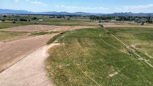 Overview of rural landscape with a mountain backdrop