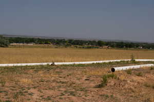 View of yard featuring a view of rural / pastoral area