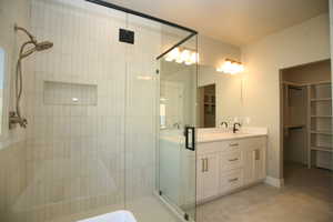 Wonderful master bathroom, with double vanity, large shower, freestanding bathtub and enclosed toilet room.