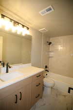 This home features for upscale bathrooms with full tile surrounds and upgraded cabinets and plumbing fixtures.