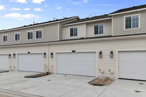 Garage featuring driveway
