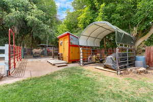 Storage shed and covered storage area
