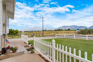 View of patio featuring a view of countryside and a mountain view