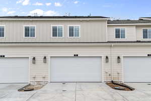 Garage featuring driveway
