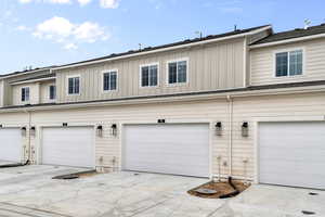 Garage with concrete driveway
