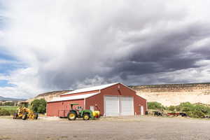 Detached garage with a mountain view