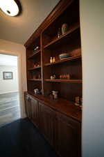 Detailed view of a textured ceiling and wood finished floors