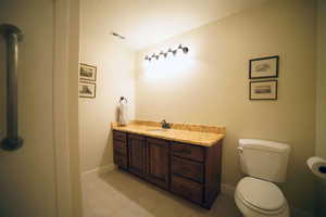 Bathroom featuring vanity and tile patterned floors