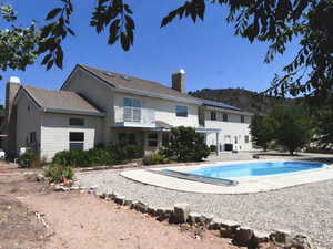 Swimming pool with a pergola