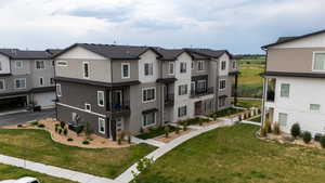 View of building exterior with a residential view