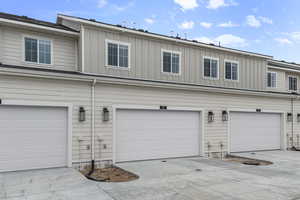 Garage featuring driveway
