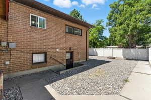 View of side of property with brick siding