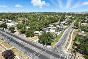 Aerial view of residential area featuring a mountain backdrop