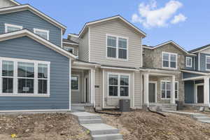 View of front of home featuring stone siding