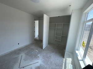 Unfurnished bedroom featuring a closet