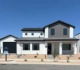 Allegiant Desert Territorial floorplan, covered porch and stucco siding