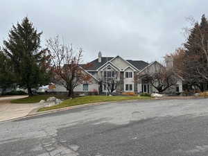 View of front facade with a chimney