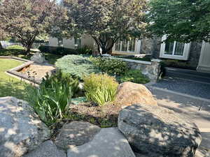 View of yard and stunning landscaping