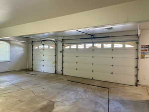 View of garage oversized with extra storage
