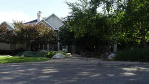 View of front of property with a chimney