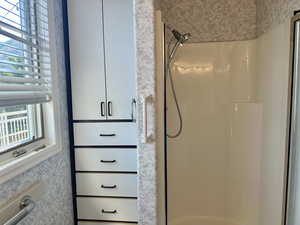 Bathroom featuring a stall shower