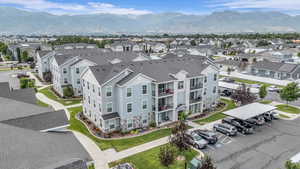 Aerial perspective of suburban area featuring a mountainous background