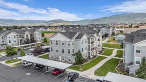 Aerial perspective of suburban area with a mountainous background