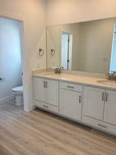 Bathroom featuring double vanity