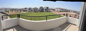 Balcony featuring a residential view