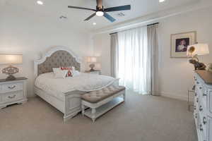 Bedroom featuring light colored carpet, recessed lighting, and a ceiling fan