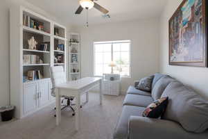 Office featuring light carpet and ceiling fan