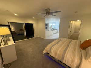 Bedroom featuring carpet flooring, recessed lighting, connected bathroom, and a ceiling fan