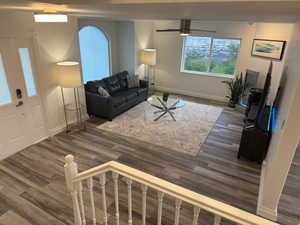 Living area with dark wood finished floors