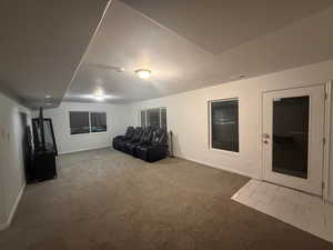 Living area with carpet flooring