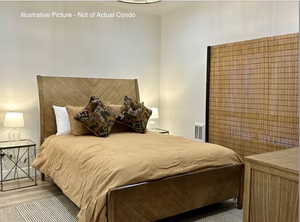 Bedroom with wood finished floors