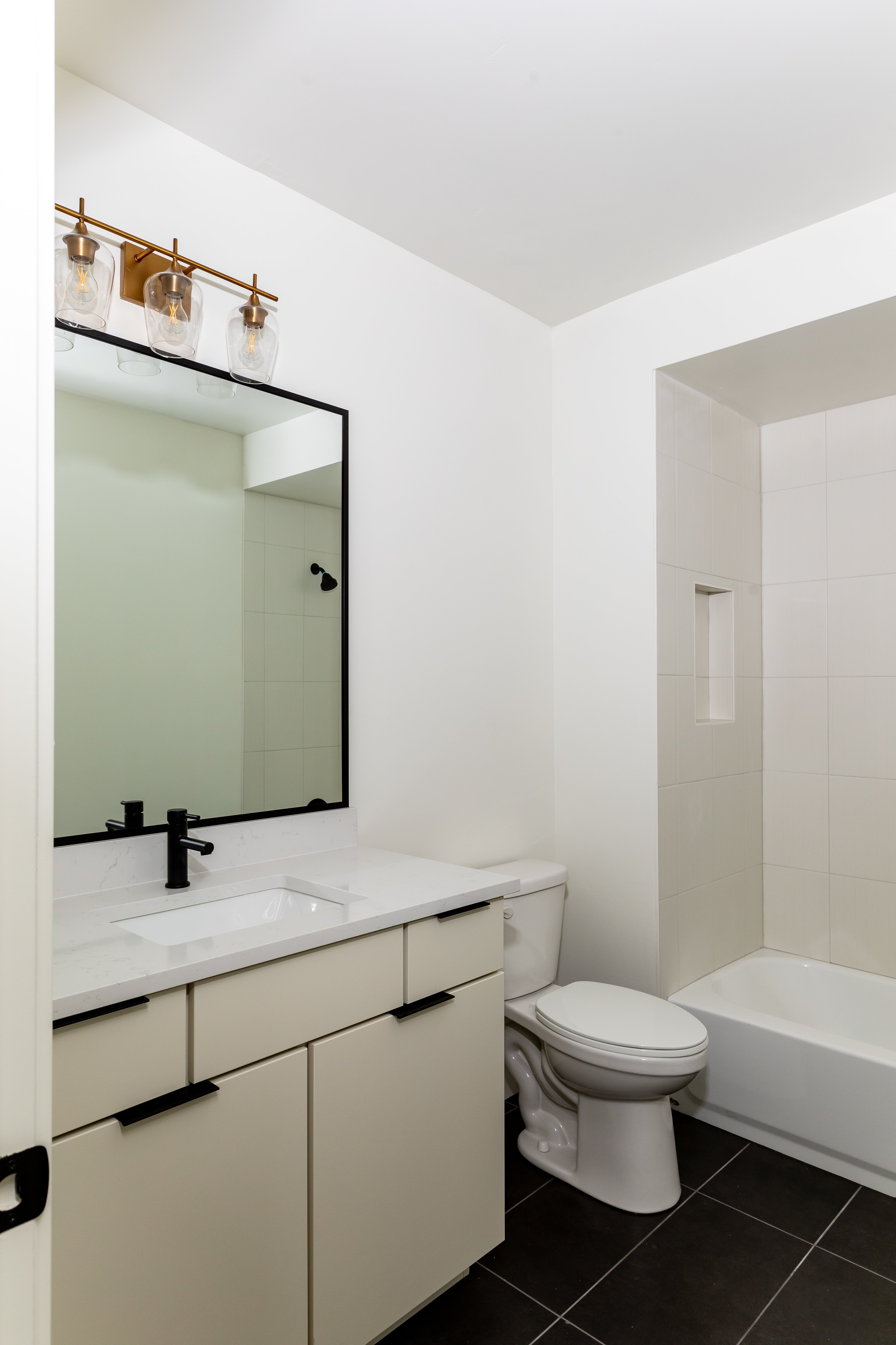 Bathroom featuring vanity and tile patterned flooring