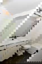 Bathroom featuring vanity and tile patterned flooring