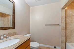 Full bathroom featuring vanity and  shower combination