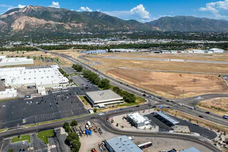 Aerial overview of property's location with a mountainous background