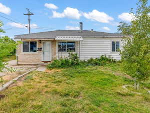 View of front of home with a front lawn
