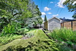 View of yard featuring a wooden deck