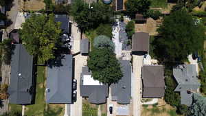 Aerial view of property's location with nearby suburban area