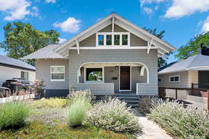 View of front of house with covered porch
