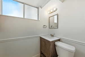 Bathroom with vanity and toilet