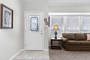 Foyer featuring healthy amount of natural light