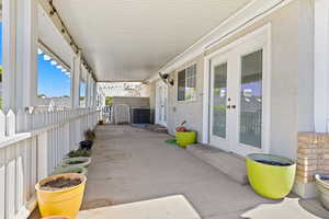 View of patio featuring french doors