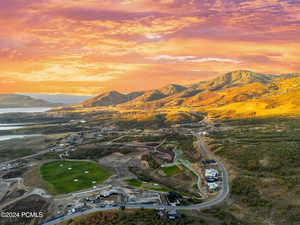 Aerial overview of property's location with a water and mountain view