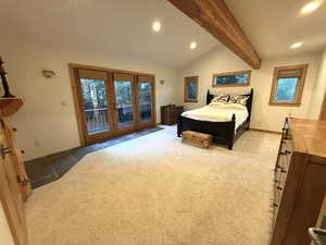 Bedroom featuring french doors, access to exterior, recessed lighting, and carpet flooring