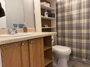 Bathroom with vanity and tile patterned floors