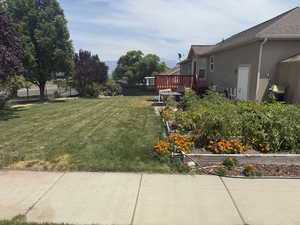View of yard featuring a deck